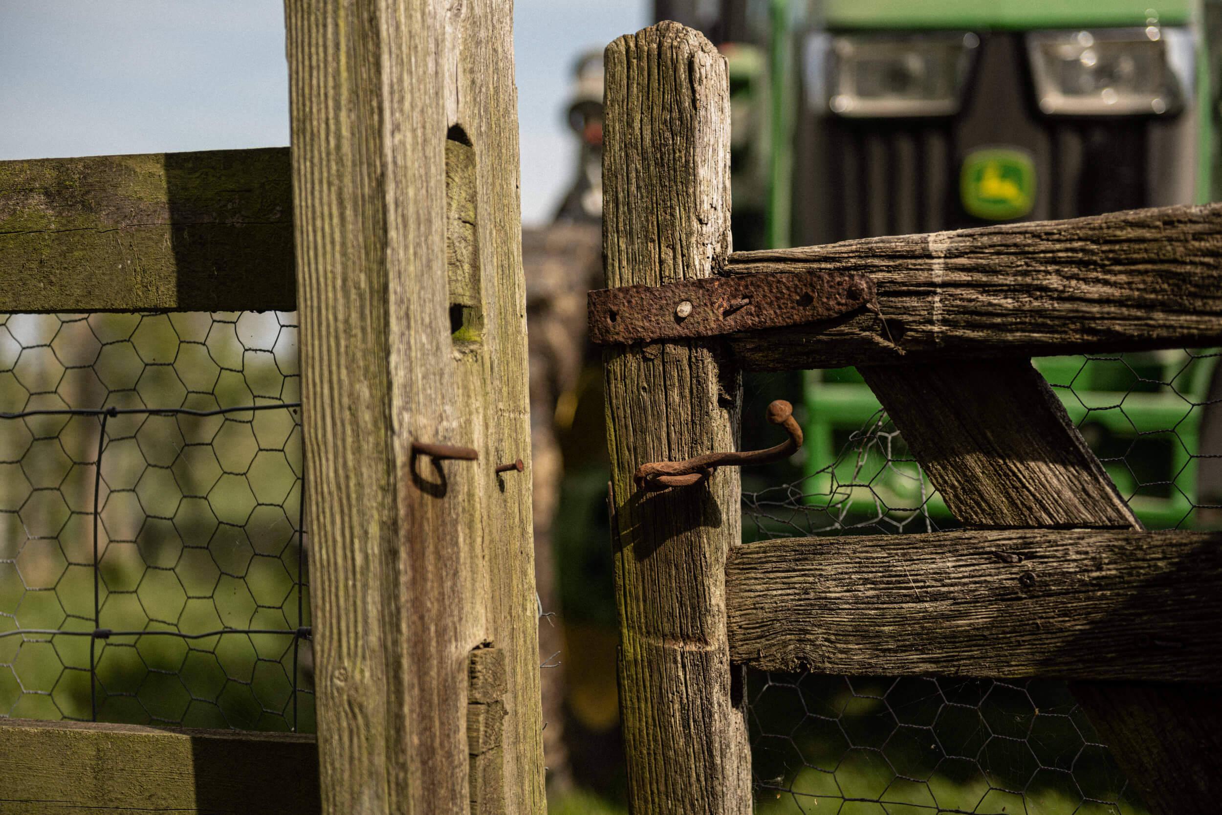 Gate with tractor in the background
