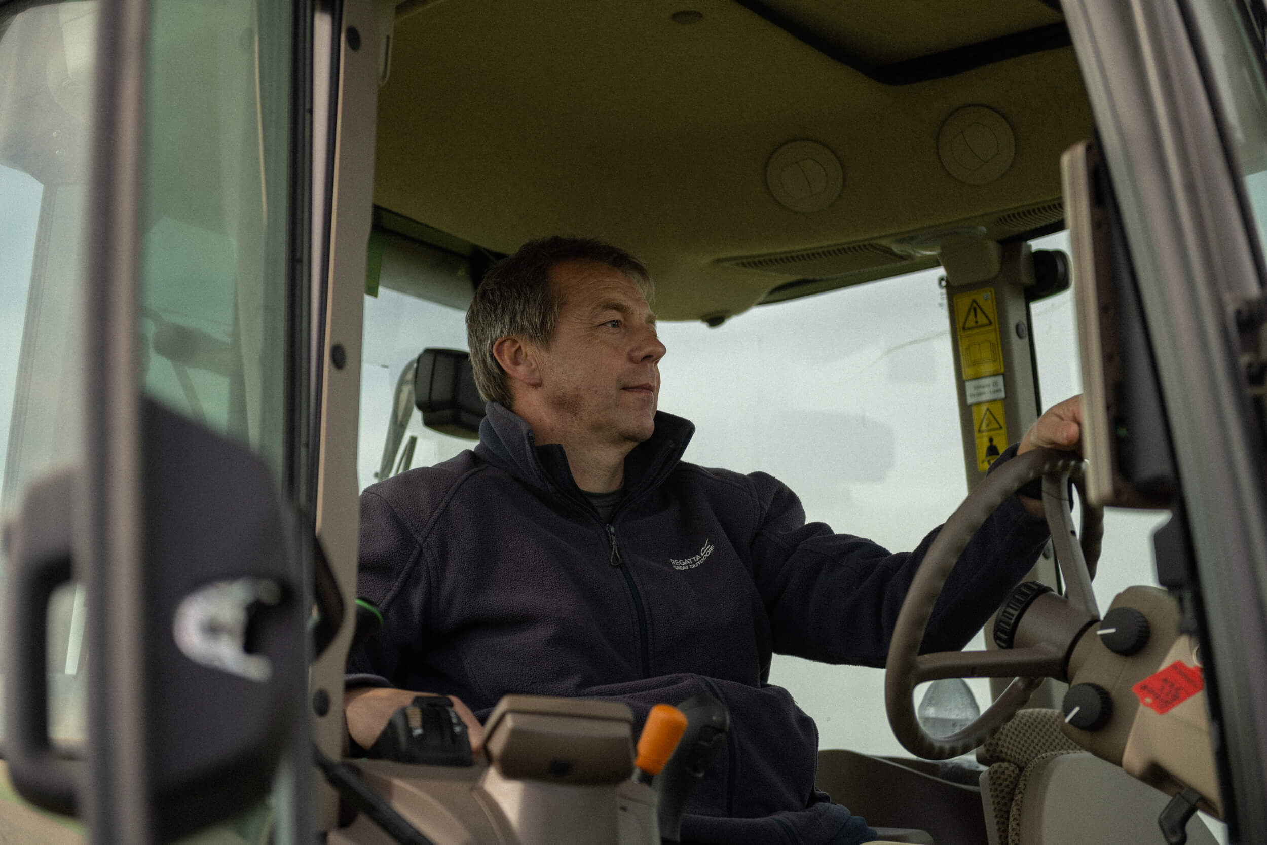Andrew Jempson driving a tractor